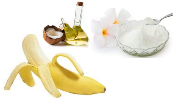 Coconut oil in a glass cruet with half of a coconut, pearl powder in a crystal bowl and a half peeled banana to showcase the ingredients in the ultimate hair repair treatment. 